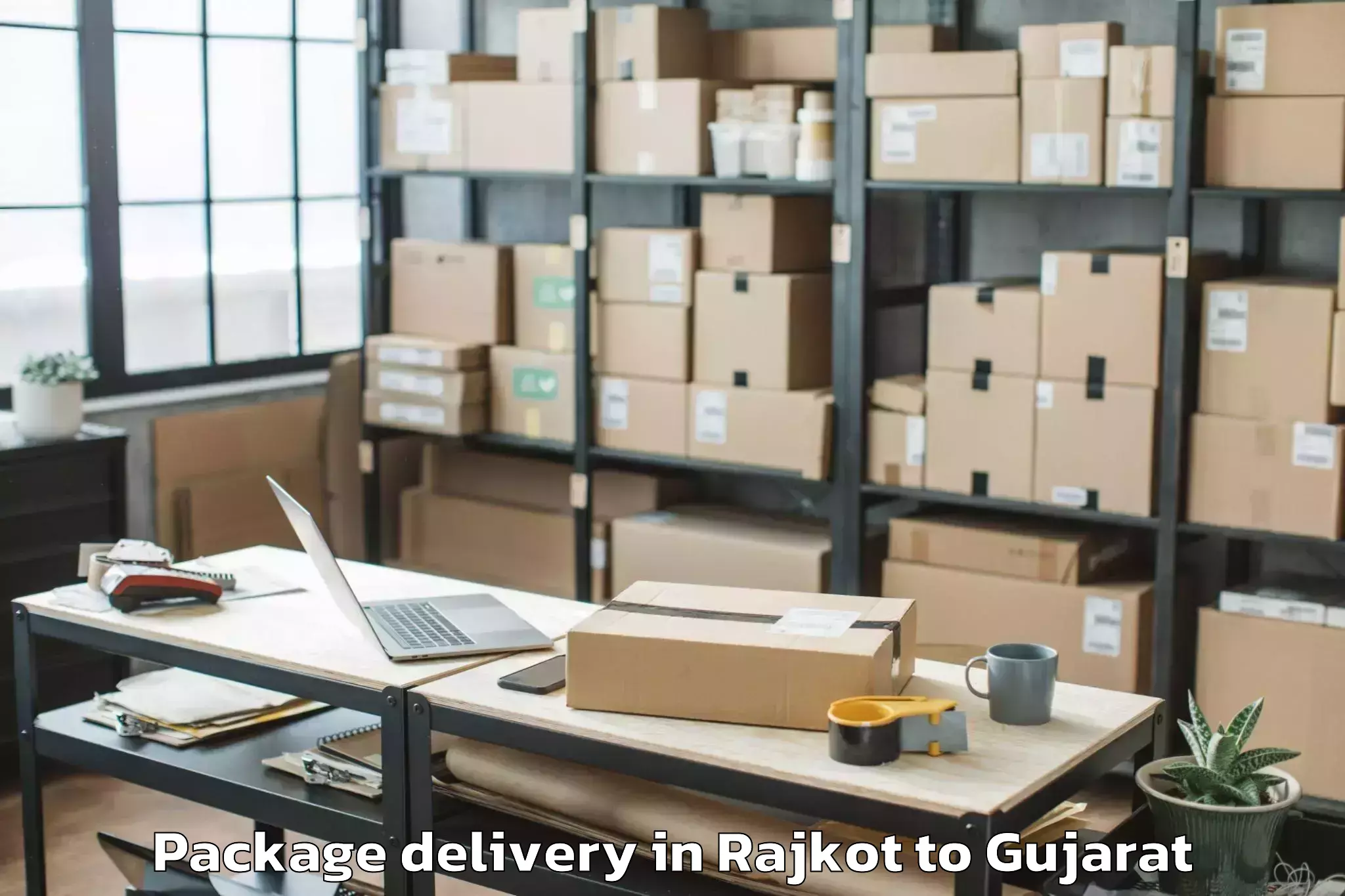 Get Rajkot to Gussar Package Delivery